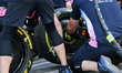In Abu Dhabi, United Arab Emirates, on December 4, 2025, BWT Alpine F1 Team's mechanics pr...