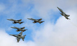 Five McDonnell Douglas EF-18 Hornets of the Spanish Air Force fly in formation over the To...