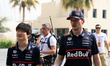 Yuki Tsunoda and Max Verstappen of Oracle Red Bull Racing participate in FP3 on Yas Island...