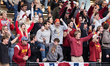 Fans celebrate a goal by USC during the 2025 NCAA men's water polo championships against U...