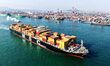 A cargo ship loaded with foreign trade containers departs from Qingdao Port in Qingdao Cit...