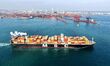 A cargo ship loaded with foreign trade containers departs from Qingdao Port in Qingdao Cit...