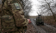 A soldier from the 5th Skif Slobozhanska Brigade of Ukraine's National Guard operates a ne...