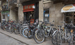 Bicycles park in front of bars in the city center of Barcelona, Spain, on October 15, 2025...