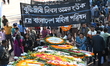 Political activists and people gather to pay tribute to the martyred intellectuals at the...