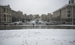 Footprints mark a thin layer of snow in Maidan Nezalezhnosti during the first snowfall in...