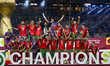 Morocco players celebrate on the podium after winning the FIFA Arab Cup 2025 final match b...