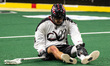 Will Malcom (4) of the Colorado Mammoth is on the ground during an NLL box lacrosse game a...