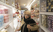 An Iranian woman shops for Christmas in a shop in downtown Tehran, Iran, on December 19, 2...
