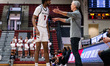 DASEAR HASKINS (7) of the St. Joseph's Hawks talks with Steve Donahue, the head coach of t...