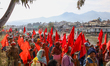 Victims of microfinance institutions and loan-sharking take part in a march in Kathmandu,...