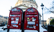 Two Danish red letterboxes stand in front of The Marble Church in Copenhagen, Denmark, on...