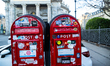 Two Danish red letterboxes stand in front of The Marble Church in Copenhagen, Denmark, on...