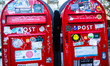 Two Danish red letterboxes stand in front of The Marble Church in Copenhagen, Denmark, on...
