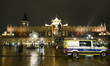 KRAKOW, POLAND – DECEMBER 22:A police van is parked near the Adam Mickiewicz statue and t...