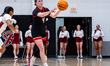 KAETY L'AMOREAUX (4) of the Fairfield Stags passes the ball during an NCAA women's basketb...