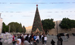 A large Christmas tree and crowds are seen on Manger Square in Bethlehem, Palestine, on De...