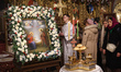 Devotees attend an all-night vigil held by the Primate of the Orthodox Church of Ukraine,...