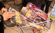 Shoppers buy firecrackers inside the Lidl retail store in Bonn, Germany, on December 29, 2...
