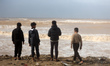 Flood waters are seen near the Mediterranean Sea in the central Gaza Strip following heavy...