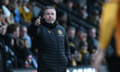 Neil Harris, manager of Cambridge United, gestures during the Sky Bet League 2 match betwe...