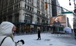 Citizens of New York City watch from the streets of Lower Manhattan as the inauguration ce...