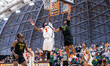 SEAN BLAKE (5) of the Vermont Catamounts goes up for a layup during an NCAA men's basketba...