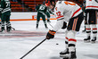 JAKE MANFRE (12) of the Princeton Tigers warms up prior to an NCAA men's ice hockey game a...