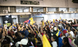 Venezuelan citizens living in the city of Medellin, Colombia, celebrate the capture of Pre...
