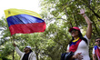 Venezuelans celebrate the arrest of Venezuelan President Nicolas Maduro by U.S. military f...