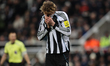 Nick Woltemade of Newcastle United shows dejection during the Premier League match between...