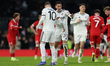 Timothy Castagne of Fulham receives instructions from Sasa Lukic of Fulham during the Emir...