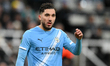 Rayan Cherki of Manchester City plays during the Carabao Cup Semi Final First Leg match be...
