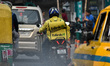 A Blinkit delivery agent is seen on the road in Kolkata, India, on January 14, 2026. Major...
