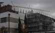 A construction worker builds a house on Djordja Magarasevica Street in the Adamovicevo Nas...