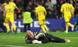 Marko Dmitrovic stands while the Girona players celebrate the goal during the match betwee...