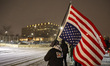 Demonstrators protest outside the Whipple federal building in Minneapolis, Minnesota, on J...