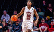 Jordan Mason (32) of the Temple Owls possesses the ball during an NCAA men's basketball ga...