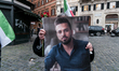 Activists and members of the Iranian community in Rome gather in Piazza Capranica, near th...