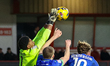Myles Roberts of Walsall FC leaps to get to the ball during the Sky Bet League 2 match bet...