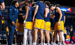 The Drexel Dragons huddle before an NCAA men's basketball game at Daskalakis Athletic Cent...