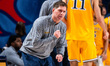 Zach Spiker, the head coach of the Drexel Dragons, exclaims during an NCAA men's basketbal...