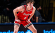MIKE LOUGHNANE (4) of the Northeastern Huskies is present during an NCAA men's basketball...