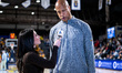 The Drexel Dragons assistant coach Paul Fortier is interviewed during an NCAA men's basket...