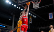 MIKE LOUGHNANE (4) of the Northeastern Huskies goes up for a layup during an NCAA men's ba...
