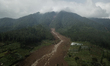 An aerial view shows part of Pasirlangu village after a landslide in Bandung Regency, West...