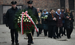OSWIECIM, POLAND – JANUARY 27:A group of Survivors on their way to lay wreaths and light...