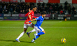 Kallum Cesay of Salford City FC tackles Dilan Markanday of Chesterfield FC during the Sky...