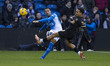 Josh Dacres-Cogley #2 of Stockport County F.C. crosses the ball during the Sky Bet League...