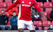 Filozofe Mabete of Swindon Town is in action during the Sky Bet League 2 match between Swi...